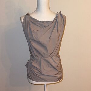 Cute grey top for a night out. Ties in back . Very flattering!